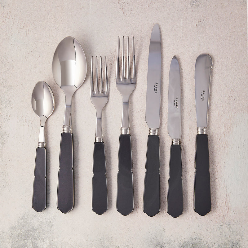 Silver with dark grey handle cutlery.