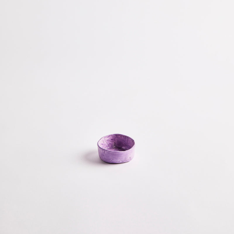 Purple pinch pot.