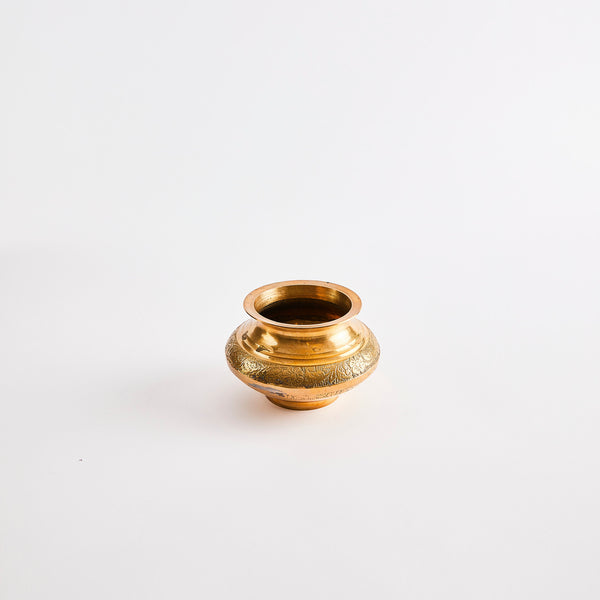 Gold pinch pot.