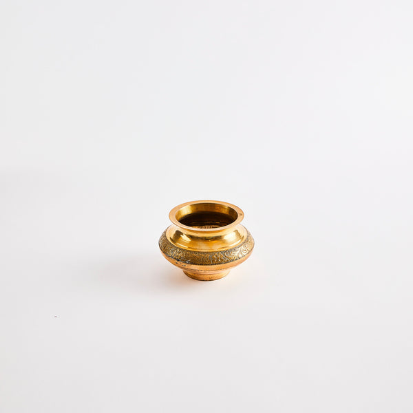 Gold pinch pot.