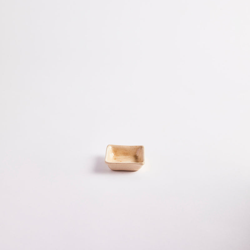 Cream square pinch pot.