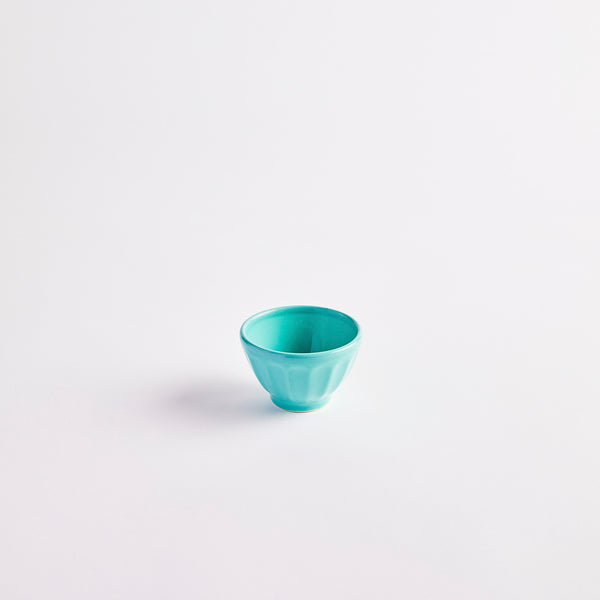 Turquoise pinch pot.