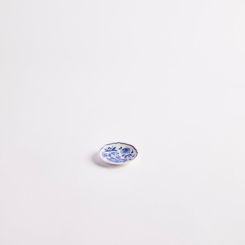 White with blue floral detailing plate. 
