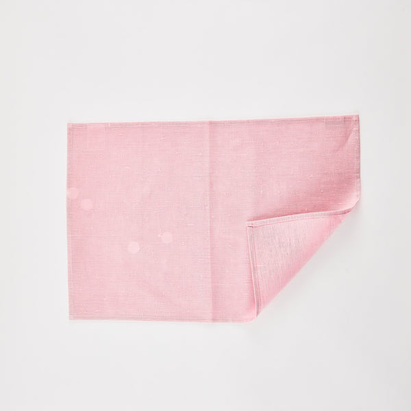 Pink placemat.