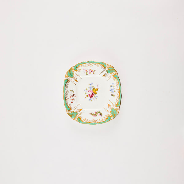 White with multicoloured floral design plate.