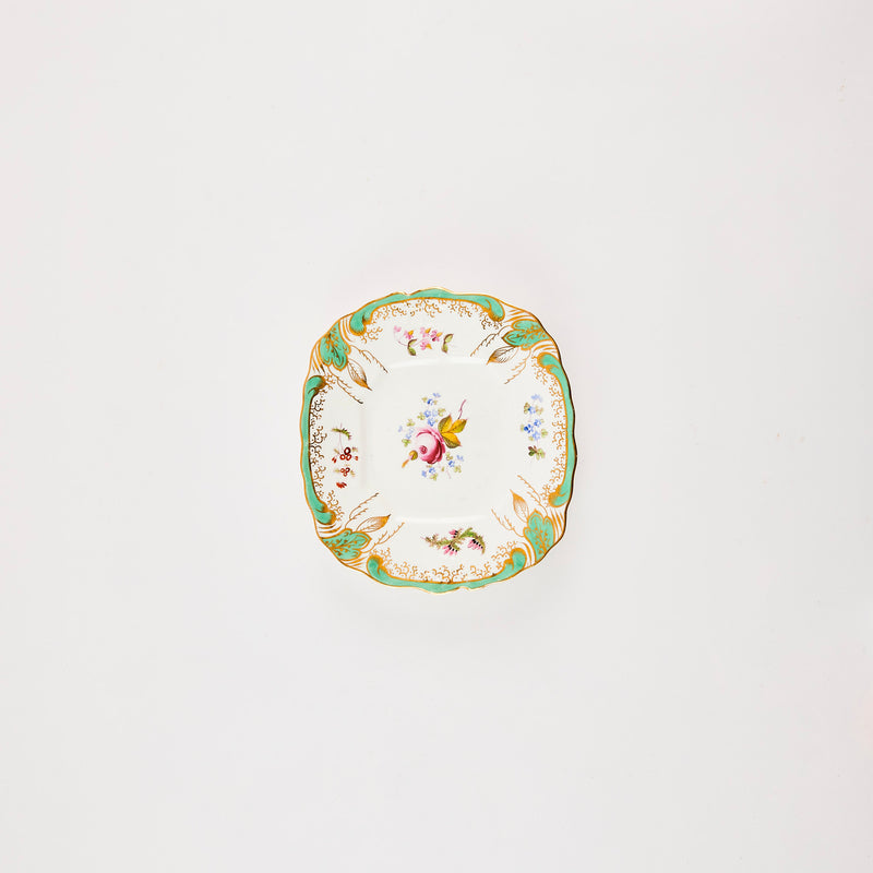 White with multicoloured floral design plate.