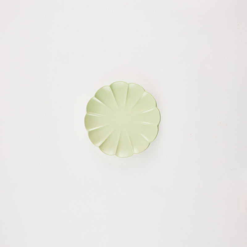 Green flower shaped plate.