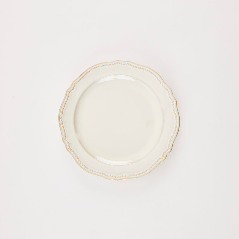 Cream antique edge plate.