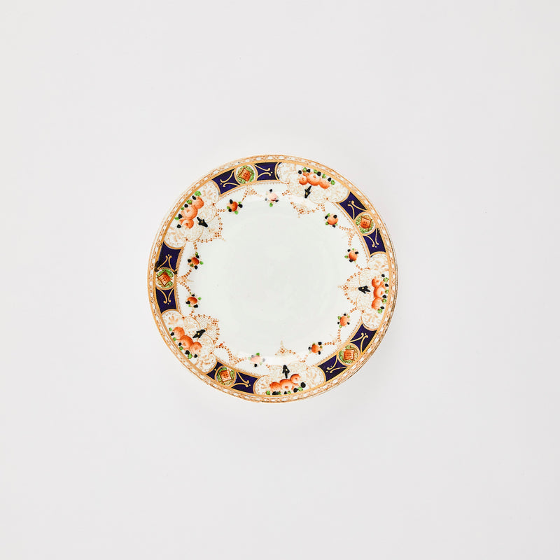 White plate with multicolour floral design.