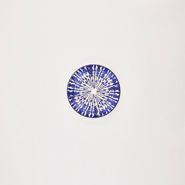 White plate with blue design.