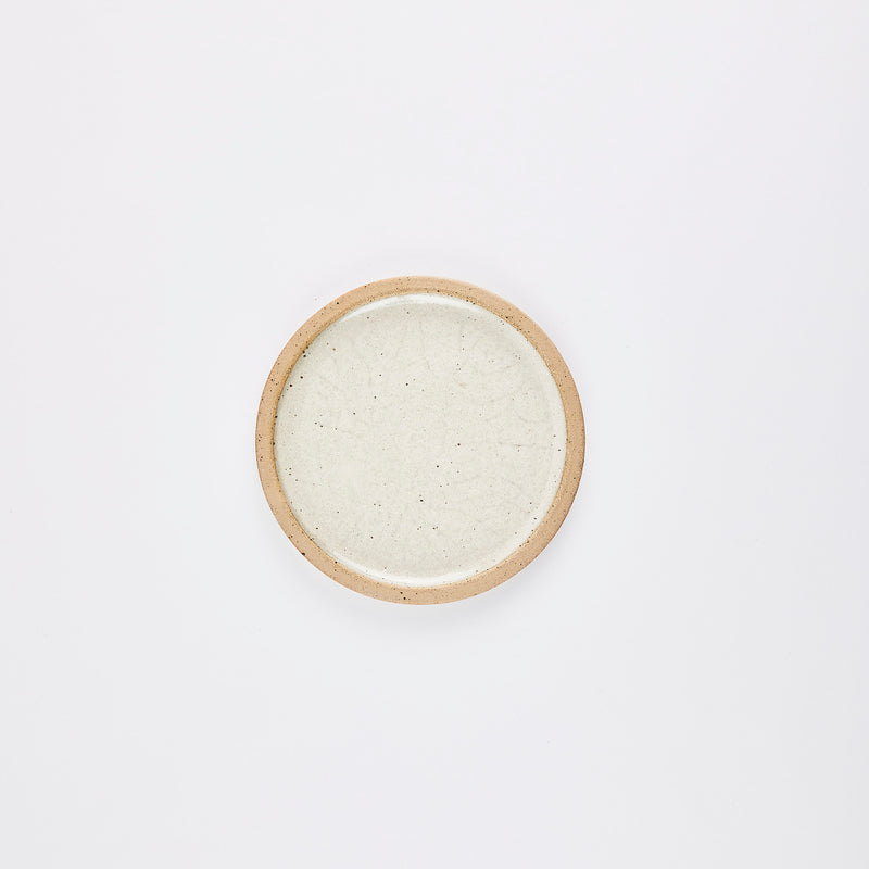 Cream plate with beige rim.