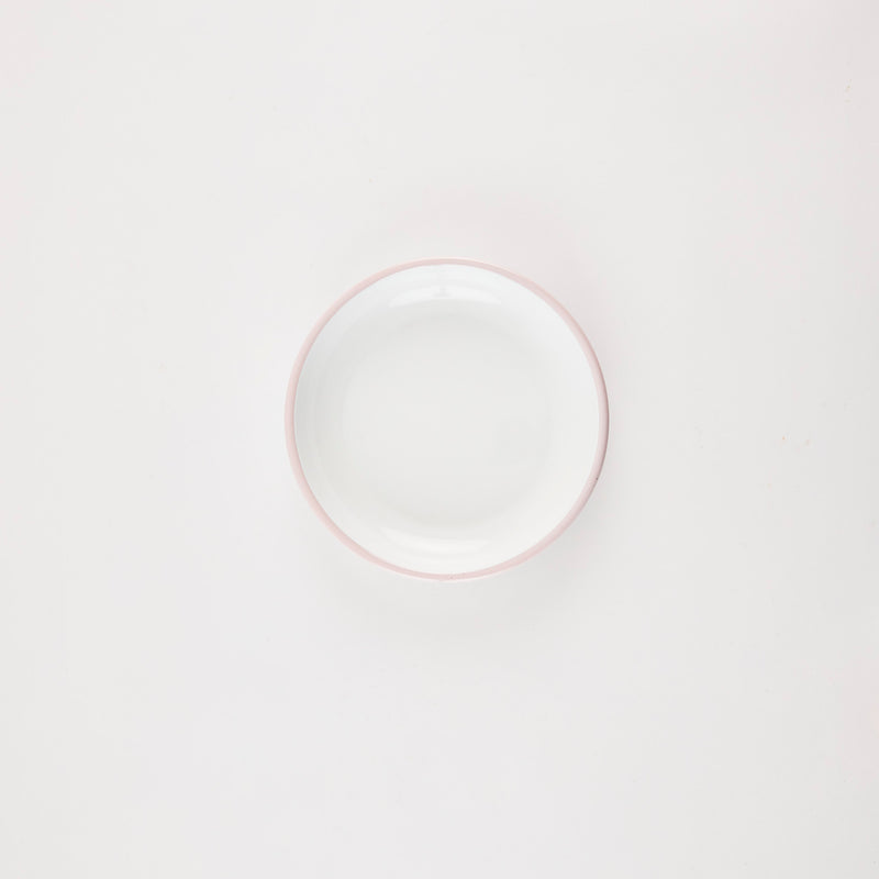 White plate with pink rim.