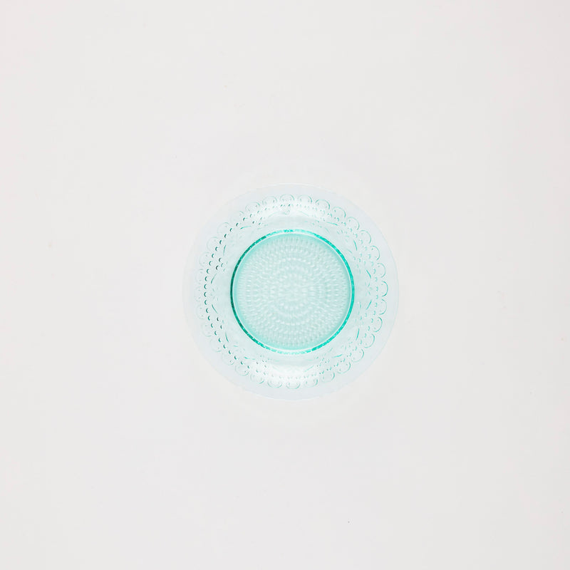 Blue glass plate with embossed design.