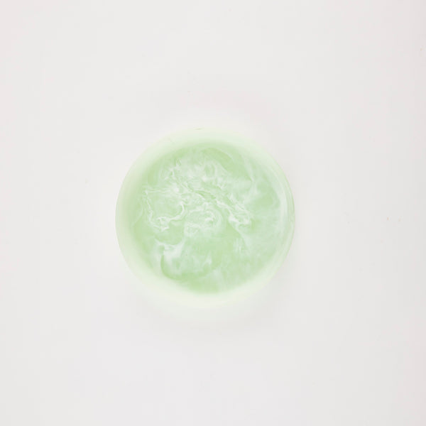 Circular green marble platter.