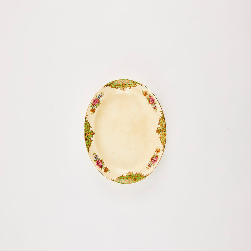 Cream vintage floral motif platter.