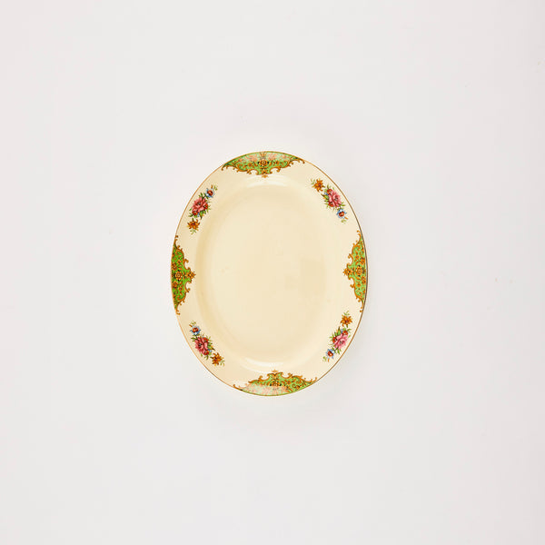 Cream vintage floral motif platter.