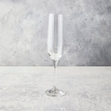 Clear champagne flute glass.
