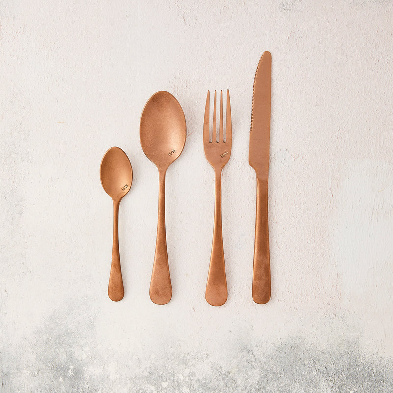 Rose gold cutlery.