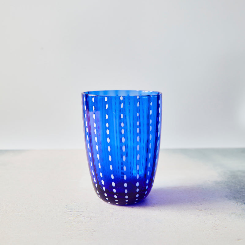 Blue with white dotted design glass tumbler.