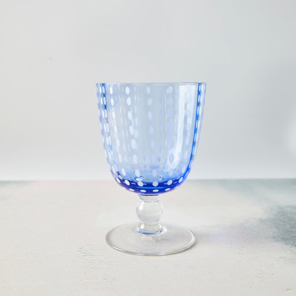 Blue with white dotted design wine glass.