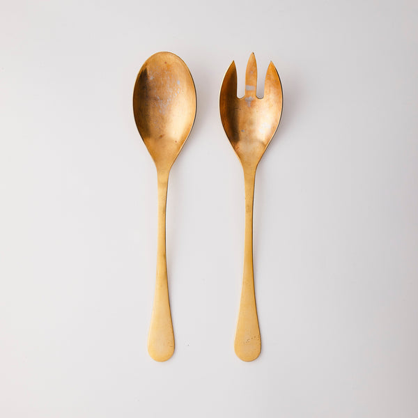 Gold serving cutlery.