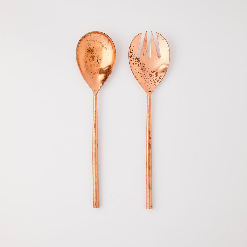 Copper serving cutlery.