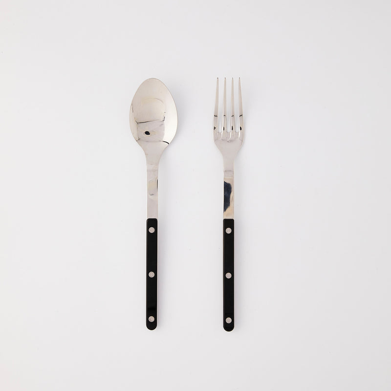 Silver cutlery with black handle.