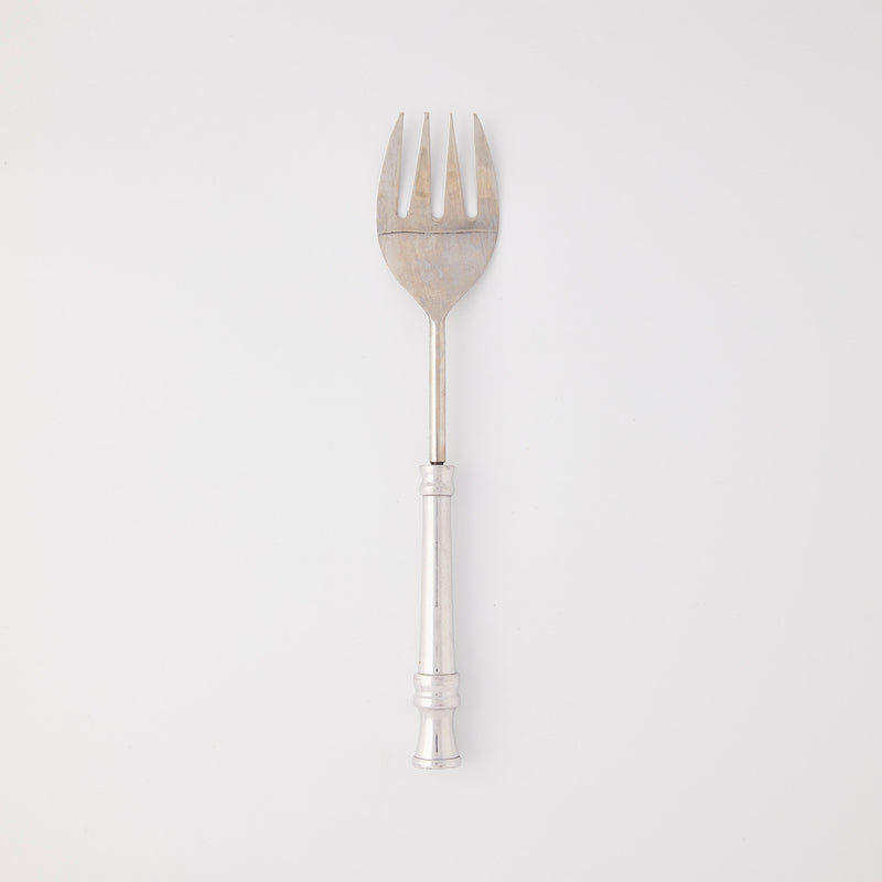 Silver serving fork.