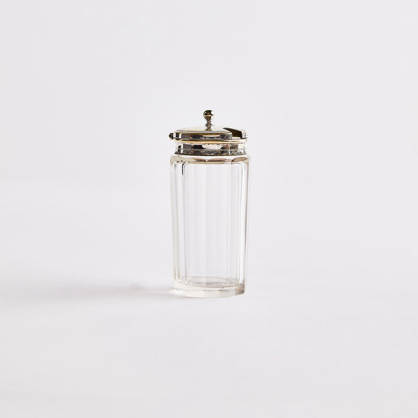 Clear glass with silver top shaker.