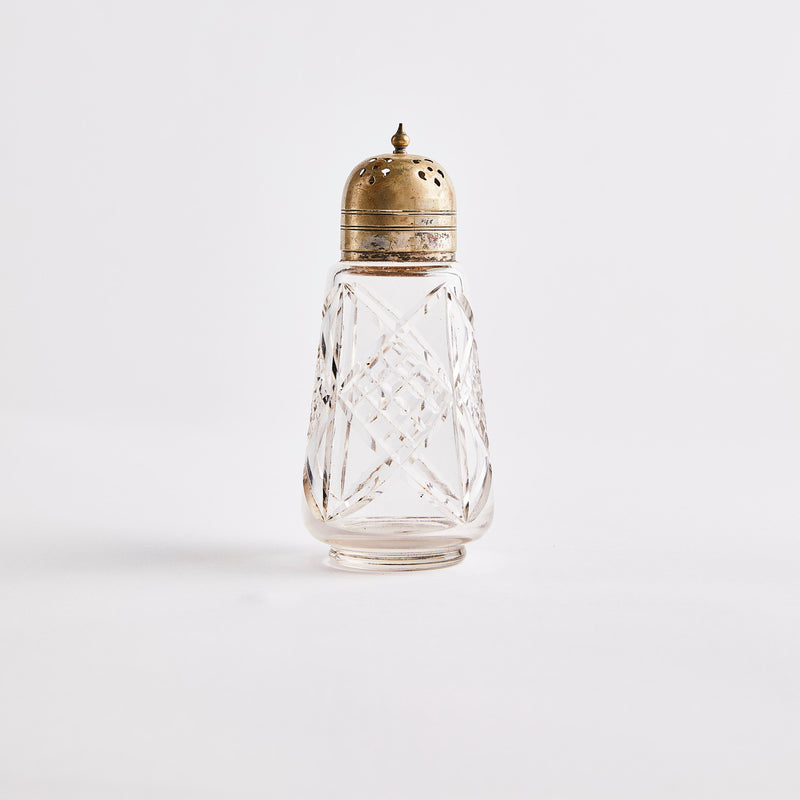 Clear glass with silver top shaker.