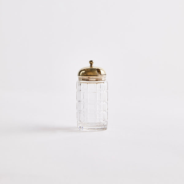 Clear glass with silver top shaker.