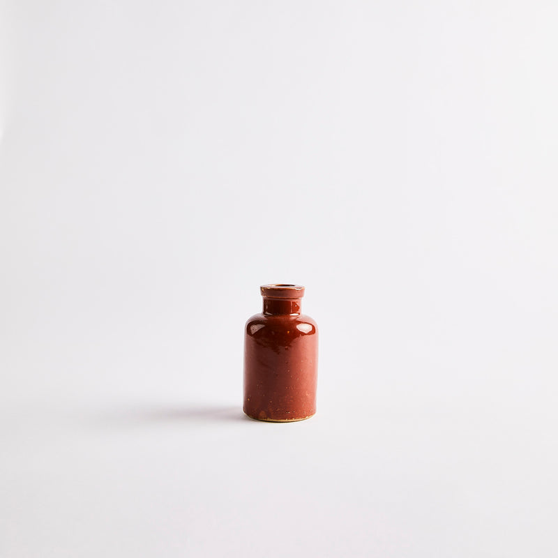 Small Brown Glossy Stoneware Bottle.