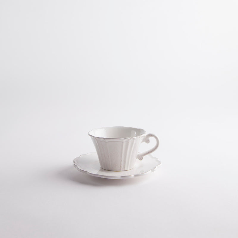 White tea cup and saucer.