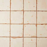 Orange and cream tile.