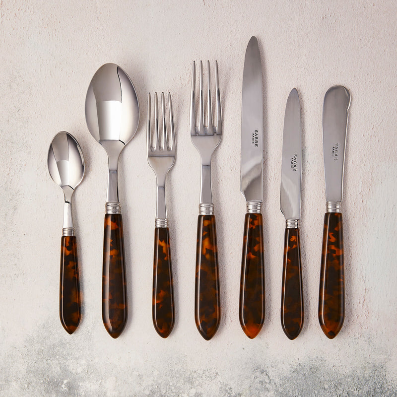 Silver with tortoise shell handle cutlery.