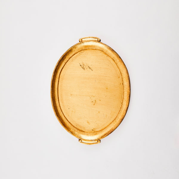 Gold oval tray.