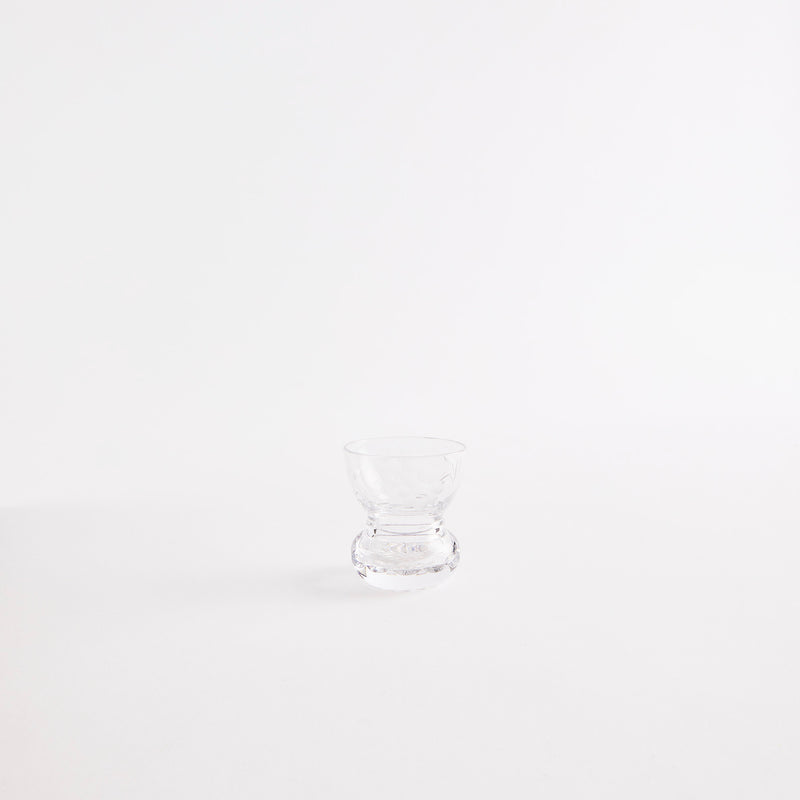 Clear glass vase.