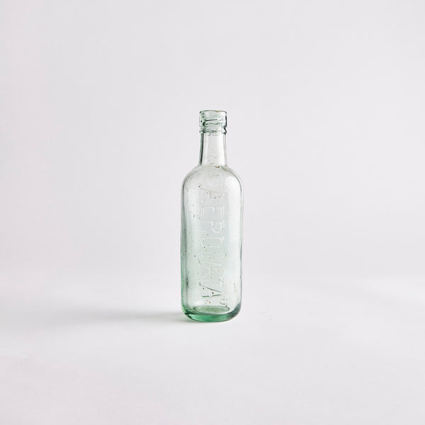 Clear Green Glass Vintage Bottle.
