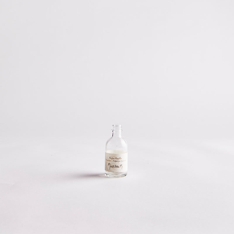 Clear Mini Vintage Bottle with Label.