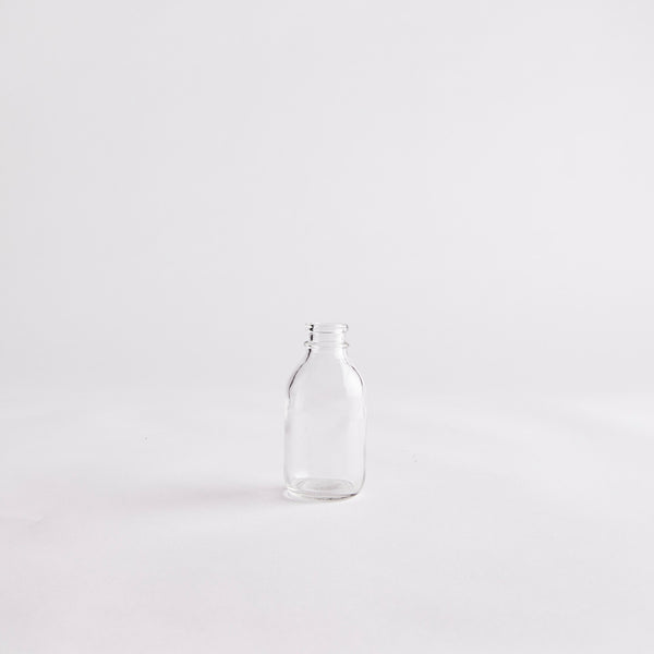 Clear Small Vintage Bottle.
