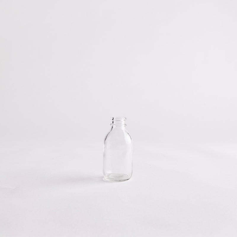 Clear Small Vintage Bottle.