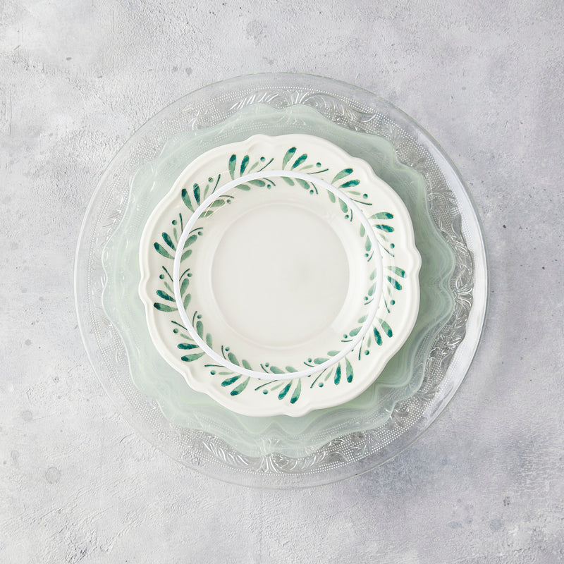 Clear embossed, cream and green mixed plate setting.
