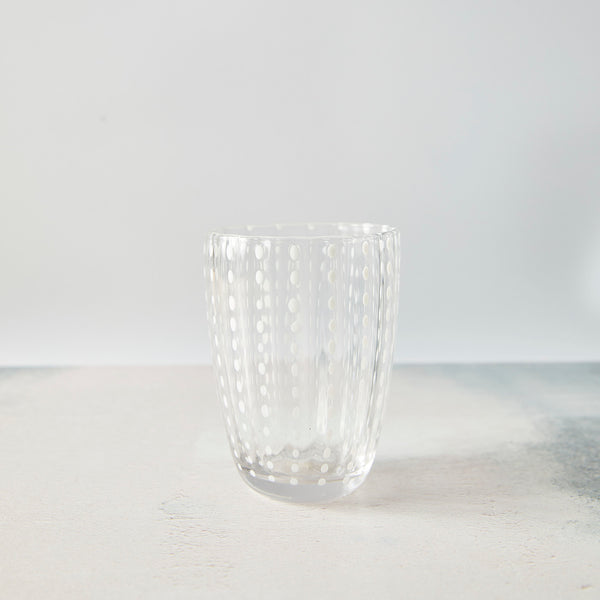 Clear with white dotted design glass tumbler.