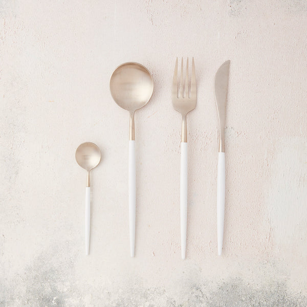 Silver with white handle cutlery.