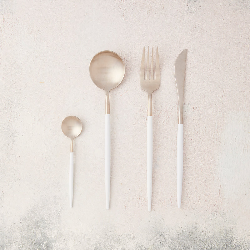 Silver with white handle cutlery.
