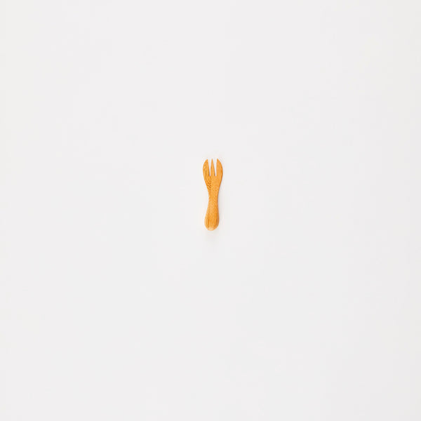 Mini wooden fork.