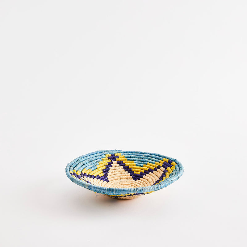 Blue and yellow star design woven basket.