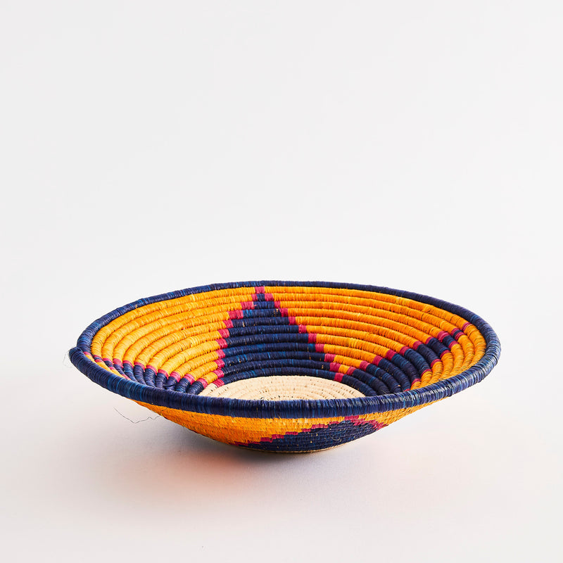 Orange and blue star design woven basket.