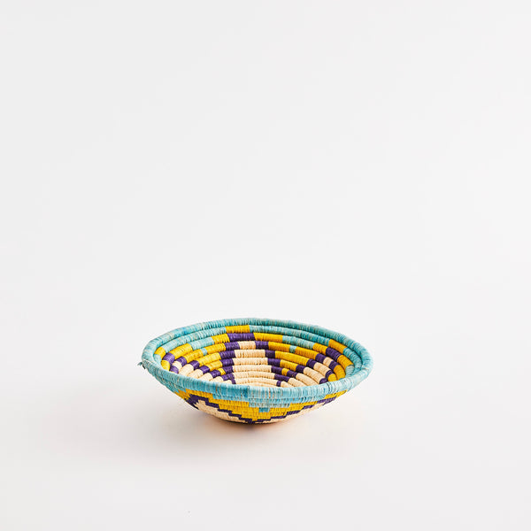 Blue and yellow star design woven basket.